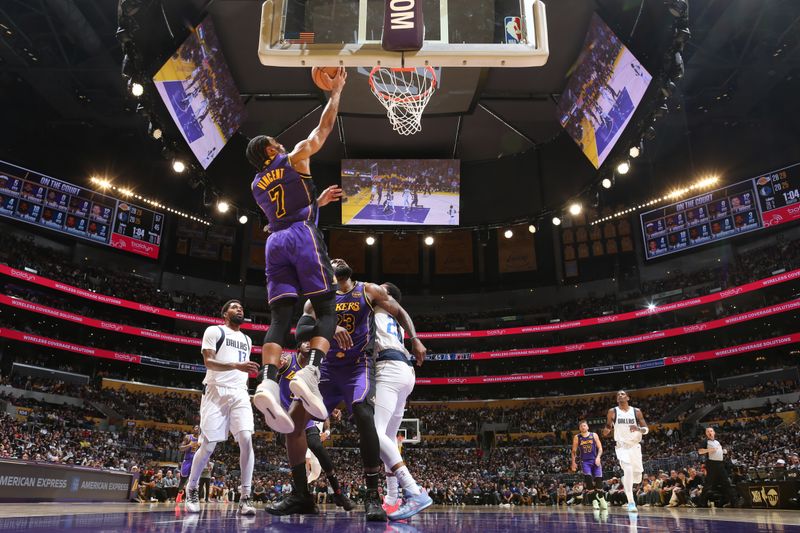 LOS ANGELES, CA - FEBRUARY 25: Gabe Vincent #7 of the Los Angeles Lakers drives to the basket during the game against the Dallas Mavericks on February 25, 2025 at Crypto.Com Arena in Los Angeles, California. NOTE TO USER: User expressly acknowledges and agrees that, by downloading and/or using this Photograph, user is consenting to the terms and conditions of the Getty Images License Agreement. Mandatory Copyright Notice: Copyright 2025 NBAE (Photo by Nathaniel S. Butler/NBAE via Getty Images)