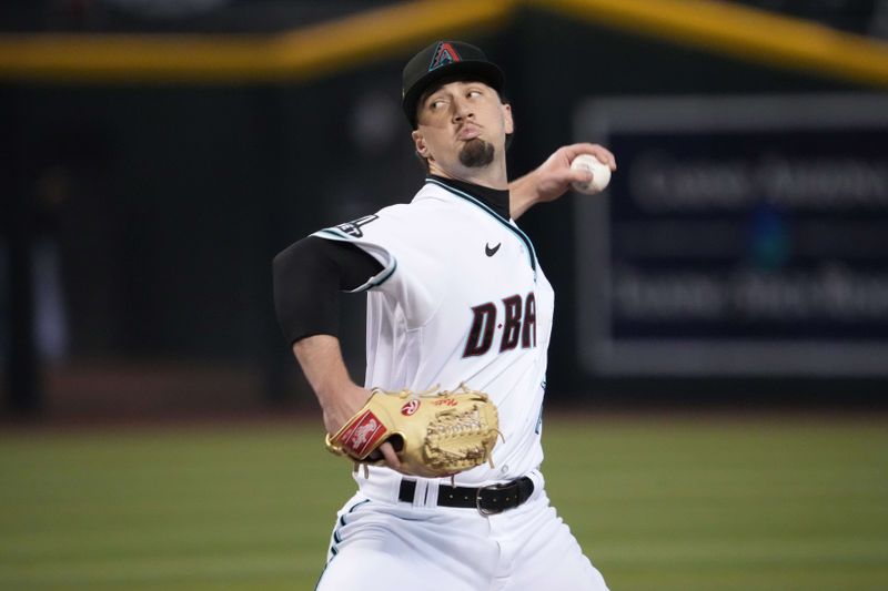 Jul 8, 2023; Phoenix, Arizona, USA; Arizona Diamondbacks starting pitcher Kyle Nelson (24) pitches against the Pittsburgh Pirates during the first inning at Chase Field. Mandatory Credit: Joe Camporeale-USA TODAY Sports