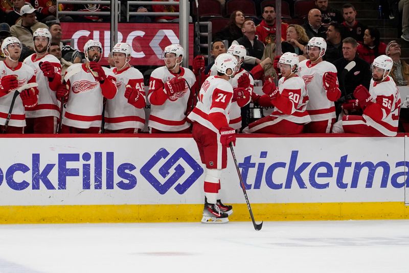 Nov 6, 2024; Chicago, Illinois, USA; Detroit Red Wings center Dylan Larkin (71) celebrates his goal against the Chicago Blackhawks during the second period at United Center. Mandatory Credit: David Banks-Imagn Images