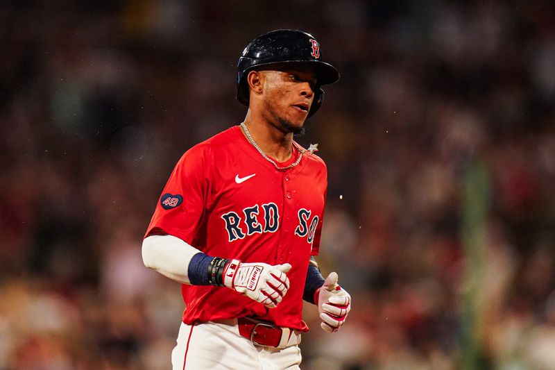 May 31, 2024; Boston, Massachusetts, USA; Boston Red Sox center fielder Ceddanne Rafaela (43) hits a two run home run against the Detroit Tigers in the sixth inning at Fenway Park. Mandatory Credit: David Butler II-USA TODAY Sports