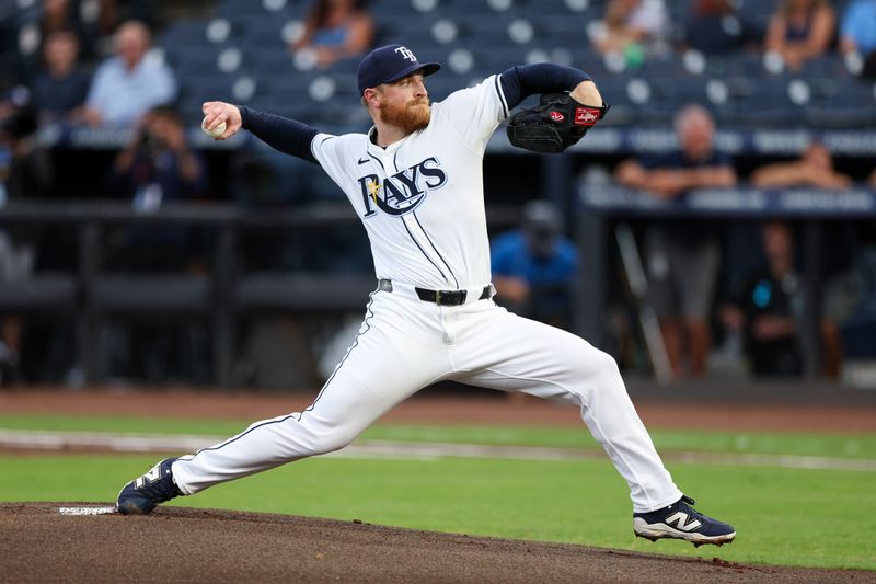 Jun 3, 2025; Tampa, Florida, USA; Tampa Bay Rays starting pitcher Drew Rasmussen (57) throws a pitch against the Texas Rangers in the first inning at George M. Steinbrenner Field. Mandatory Credit: Nathan Ray Seebeck-Imagn Images