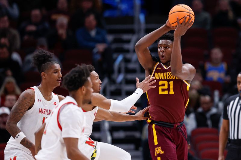 Mar 9, 2023; Chicago, IL, USA; Minnesota Golden Gophers forward Pharrel Payne (21) looks to pass the ball against the Maryland Terrapins during the first half at United Center. Mandatory Credit: Kamil Krzaczynski-USA TODAY Sports