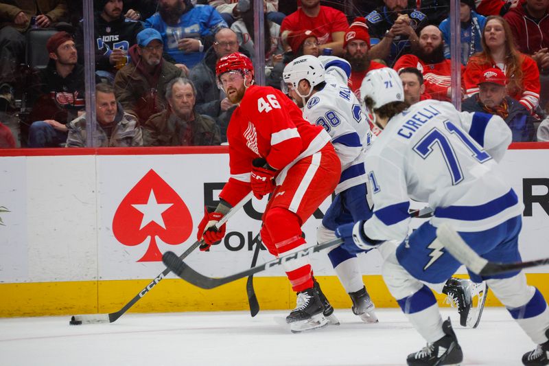 Jan 21, 2024; Detroit, Michigan, USA; Detroit Red Wings defenseman Jeff Petry (46) handles the puck during the first period at Little Caesars Arena. Mandatory Credit: Brian Bradshaw Sevald-USA TODAY Sports