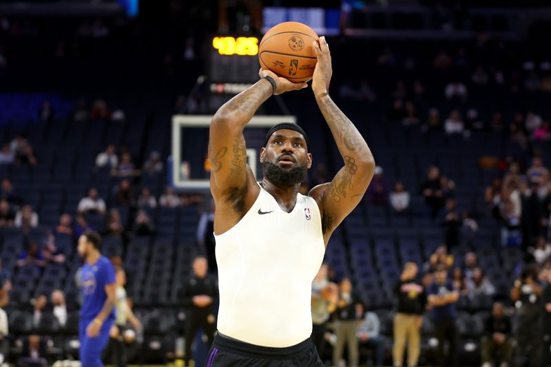 SAN FRANCISCO, CALIFORNIA - OCTOBER 18: LeBron James #23 of the Los Angeles Lakers warms up before their preseason game against the Golden State Warriors at Chase Center on October 18, 2024 in San Francisco, California.  NOTE TO USER: User expressly acknowledges and agrees that, by downloading and/or using this photograph, user is consenting to the terms and conditions of the Getty Images License Agreement.  (Photo by Ezra Shaw/Getty Images)