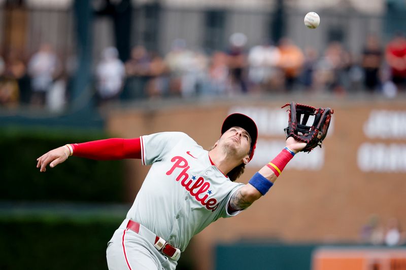 Jun 26, 2024; Detroit, Michigan, USA;  Philadelphia Phillies second baseman Bryson Stott (5) catches a fly ball against the Detroit Tigers in the second inning at Comerica Park. Mandatory Credit: Rick Osentoski-USA TODAY Sports