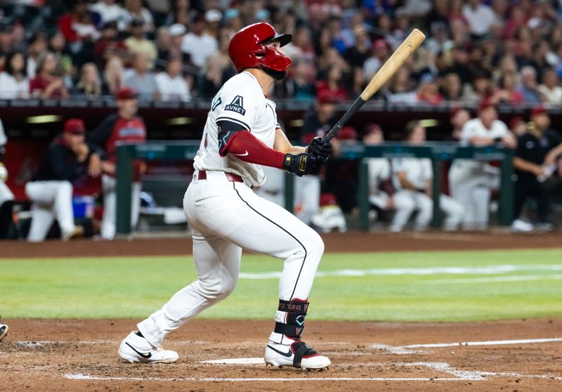 Sep 16, 2025; Phoenix, Arizona, USA; Arizona Diamondbacks catcher Adrian Del Castillo hits a two run home run in the second inning against the San Francisco Giants at Chase Field. Mandatory Credit: Mark J. Rebilas-Imagn Images