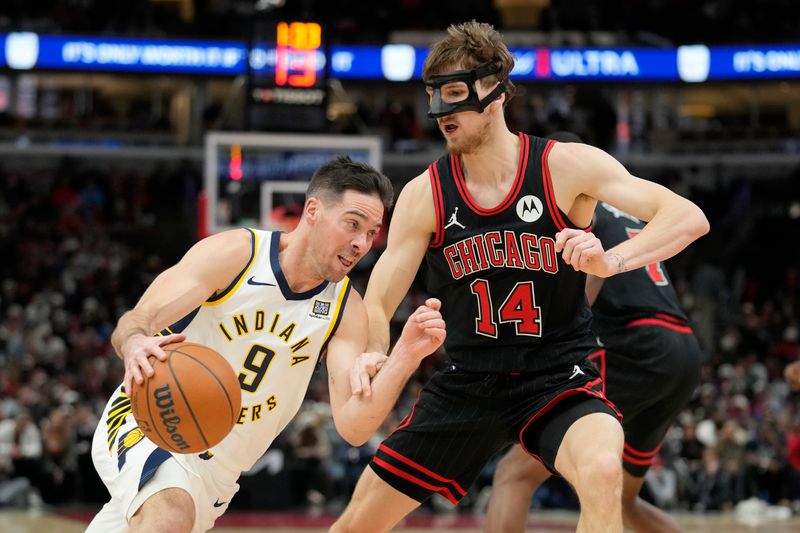 CHICAGO, ILLINOIS - DECEMBER 06: T.J. McConnell #9 of the Indiana Pacers dribbles the ball against Matas Buzelis #14 of the Chicago Bulls during the third quarter of a game at the United Center on December 06, 2024 in Chicago, Illinois. NOTE TO USER: User expressly acknowledges and agrees that, by downloading and or using this photograph, User is consenting to the terms and conditions of the Getty Images License Agreement. (Photo by Patrick McDermott/Getty Images)