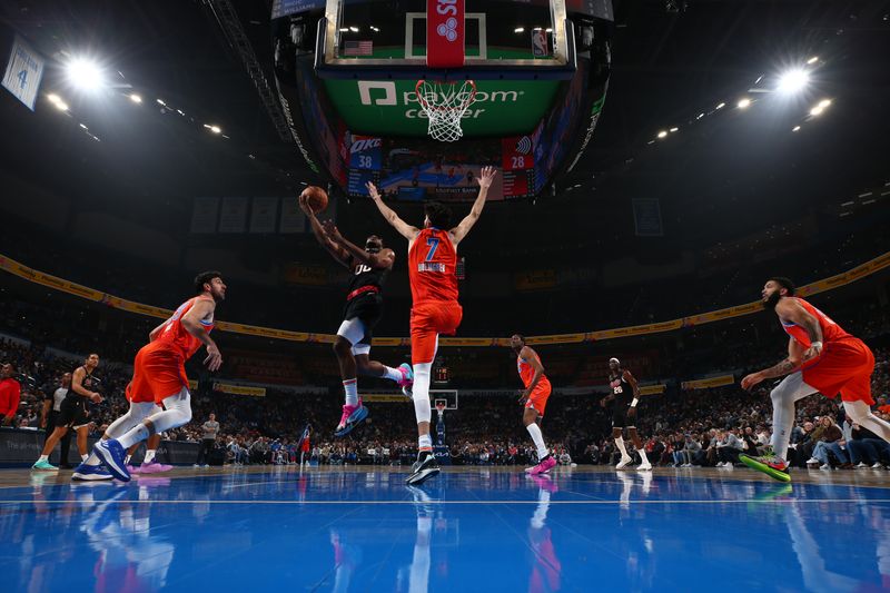 OKLAHOMA CITY, OK - JANUARY 23: Scoot Henderson #00 of the Portland Trail Blazers shoots the ball during the game against the Oklahoma City Thunder on January 23, 2024 at Paycom Arena in Oklahoma City, Oklahoma. NOTE TO USER: User expressly acknowledges and agrees that, by downloading and or using this photograph, User is consenting to the terms and conditions of the Getty Images License Agreement. Mandatory Copyright Notice: Copyright 2024 NBAE (Photo by Zach Beeker/NBAE via Getty Images)