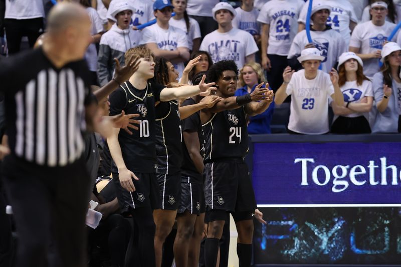 Feb 13, 2024; Provo, Utah, USA; The Central Florida Knights bench reacts to a shot against the Brigham Young Cougars during the second half at Marriott Center. Mandatory Credit: Rob Gray-USA TODAY Sports