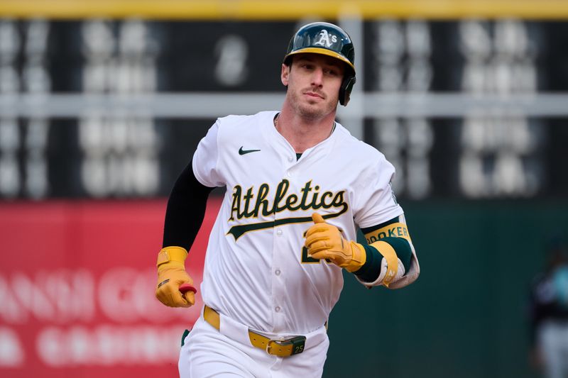 May 4, 2024; Oakland, California, USA; Oakland Athletics designated hitter Brent Rooker (25) runs the bases after hitting a two-run home run against the Miami Marlins during the third inning at Oakland-Alameda County Coliseum. Mandatory Credit: Robert Edwards-USA TODAY Sports
