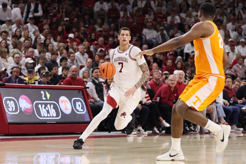 Jan 3, 2026; Fayetteville, Arkansas, USA; Arkansas Razorbacks forward Trevon Brazile (7) drives during the second half against the Tennessee Volunteers at Bud Walton Arena. Mandatory Credit: Nelson Chenault-Imagn Images