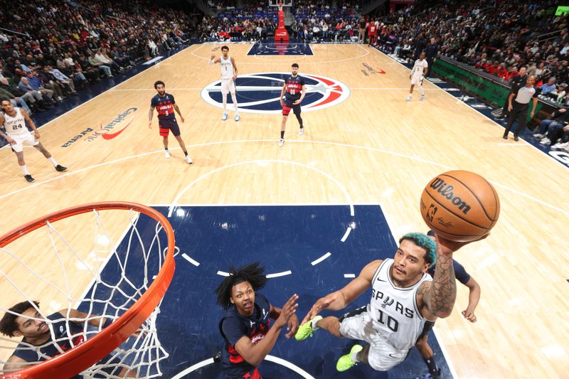 WASHINGTON, DC - FEBRUARY 10: Jeremy Sochan #10 of the San Antonio Spurs drives to the basket during the game against the Washington Wizards on February 10, 2025 at Capital One Arena in Washington, DC. NOTE TO USER: User expressly acknowledges and agrees that, by downloading and or using this Photograph, user is consenting to the terms and conditions of the Getty Images License Agreement. Mandatory Copyright Notice: Copyright 2025 NBAE (Photo by Stephen Gosling/NBAE via Getty Images)