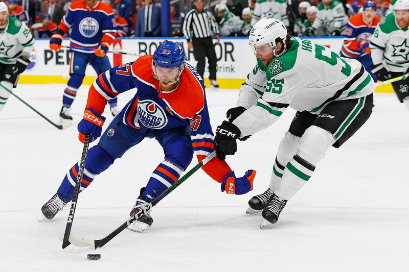 Jun 2, 2024; Edmonton, Alberta, CAN; Edmonton Oilers forward Connor McDavid (97) carries the puck around Dallas Stars defensemen Thomas Harley (55) during the first period in game six of the Western Conference Final of the 2024 Stanley Cup Playoffs at Rogers Place. Mandatory Credit: Perry Nelson-USA TODAY Sports