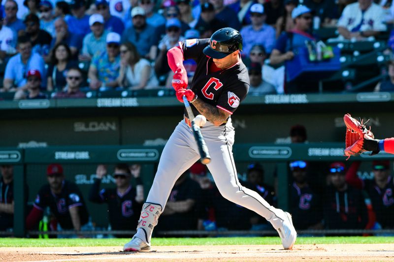 Feb 27, 2026; Mesa, Arizona, USA; Cleveland Guardians shortstop Brayan Rocchio (4) breaks his bat in the first inning against the Chicago Cubs at Sloan Park. Mandatory Credit: Matt Kartozian-Imagn Images