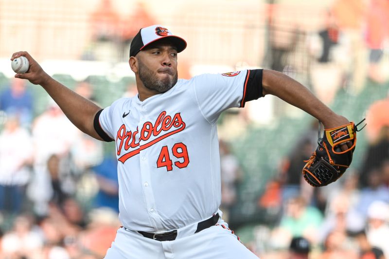 Jun 11, 2024; Baltimore, Maryland, USA; Baltimore Orioles pitcher Albert Suárez (49)  throws a second inning pitch against the Atlanta Braves  at Oriole Park at Camden Yards. Mandatory Credit: Tommy Gilligan-USA TODAY Sports