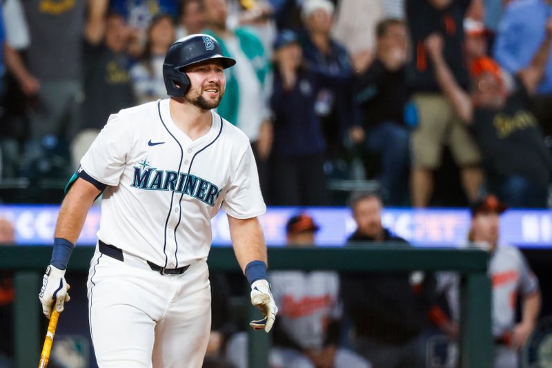 Jul 2, 2024; Seattle, Washington, USA; Seattle Mariners catcher Cal Raleigh (29) watches a potential game-tying home run go foul during the ninth inning against the Baltimore Orioles at T-Mobile Park. Mandatory Credit: Joe Nicholson-USA TODAY Sports