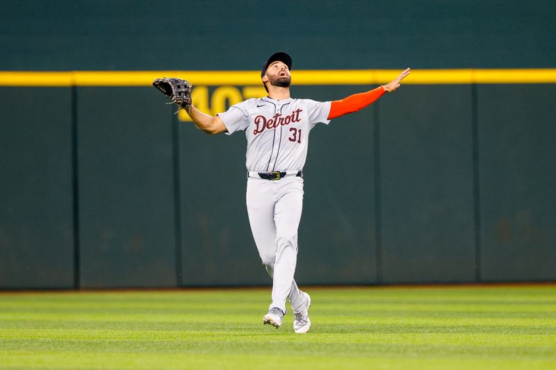 Jun 4, 2024; Arlington, Texas, USA; Detroit Tigers outfielder Riley Greene (31) calls for a fly ball during the sixth inning against the Texas Rangers at Globe Life Field. Mandatory Credit: Andrew Dieb-USA TODAY Sports