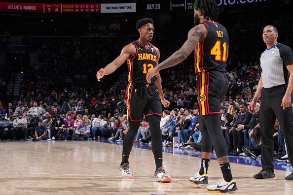 PHILADELPHIA, PA - DECEMBER 8: De'Andre Hunter #12 and Saddiq Bey #41 of the Atlanta Hawks high five during the game against the Philadelphia 76ers on December 8, 2023 at the Wells Fargo Center in Philadelphia, Pennsylvania NOTE TO USER: User expressly acknowledges and agrees that, by downloading and/or using this Photograph, user is consenting to the terms and conditions of the Getty Images License Agreement. Mandatory Copyright Notice: Copyright 2023 NBAE (Photo by Jesse D. Garrabrant/NBAE via Getty Images)