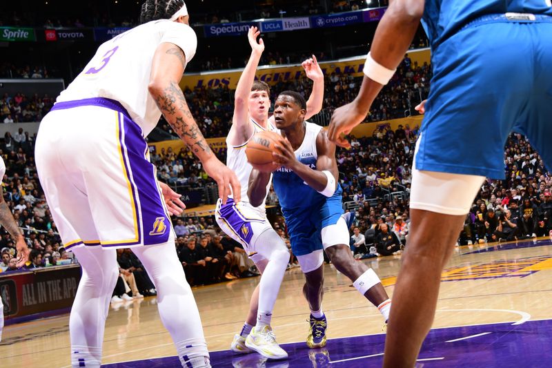 LOS ANGELES, CA - MARCH 10: Anthony Edwards #5 of the Minnesota Timberwolves drives to the basket during the game against the Los Angeles Lakers on March 10, 2024 at Crypto.Com Arena in Los Angeles, California. NOTE TO USER: User expressly acknowledges and agrees that, by downloading and/or using this Photograph, user is consenting to the terms and conditions of the Getty Images License Agreement. Mandatory Copyright Notice: Copyright 2024 NBAE (Photo by Adam Pantozzi/NBAE via Getty Images)