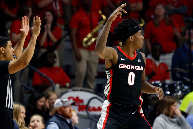 Jan 14, 2023; Oxford, Mississippi, USA; Georgia Bulldogs guard Terry Roberts (0) reacts after a three point basket during the second half against the Mississippi Rebels at The Sandy and John Black Pavilion at Ole Miss. Mandatory Credit: Petre Thomas-USA TODAY Sports