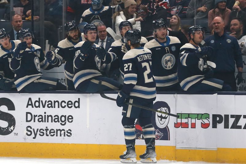 Nov 15, 2024; Columbus, Ohio, USA; Columbus Blue Jackets center Zach Aston-Reese (27) celebrates his goal against the Pittsburgh Penguins during the first period at Nationwide Arena. Mandatory Credit: Russell LaBounty-Imagn Images