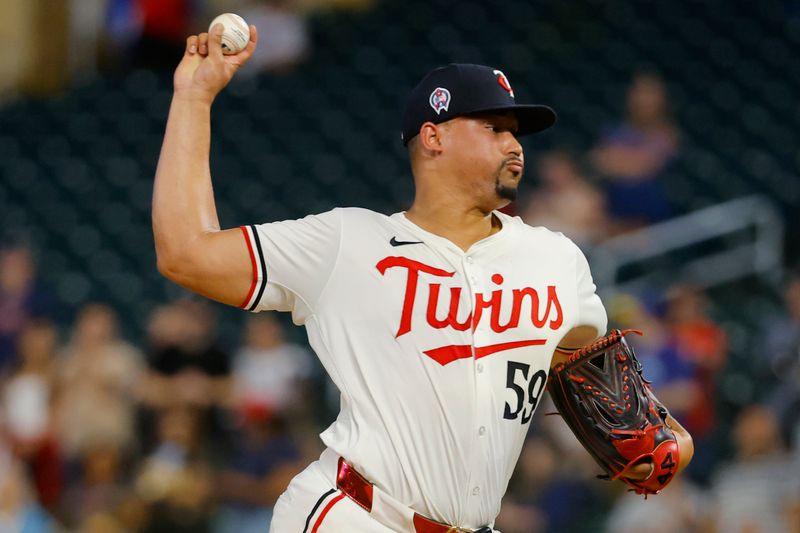 Sep 11, 2024; Minneapolis, Minnesota, USA; Minnesota Twins relief pitcher Jhoan Duran (59) throws to the Los Angeles Angels in the ninth inning at Target Field. Mandatory Credit: Bruce Kluckhohn-Imagn Images