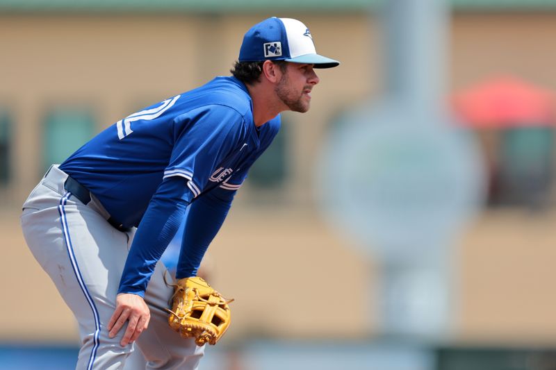 Mar 15, 2025; Jupiter, Florida, USA; Toronto Blue Jays third baseman Ernie Clement (22) looks on against the St. Louis Cardinals during the second inning at Roger Dean Chevrolet Stadium. Mandatory Credit: Sam Navarro-Imagn Images