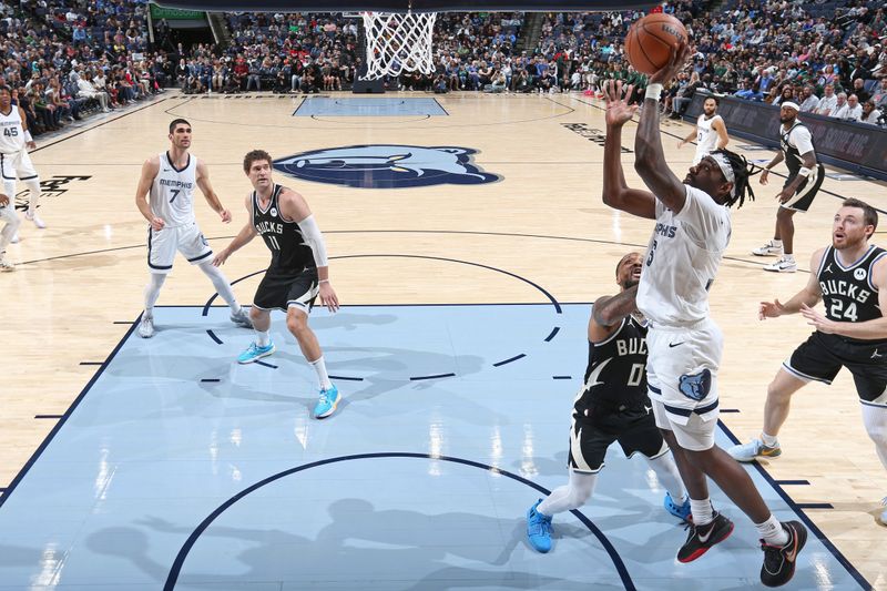 MEMPHIS, TN - FEBRUARY 15: Vince Williams Jr. #5 of the Memphis Grizzlies drives to the basket during the game against the Milwaukee Bucks on February 15, 2024 at FedExForum in Memphis, Tennessee. NOTE TO USER: User expressly acknowledges and agrees that, by downloading and or using this photograph, User is consenting to the terms and conditions of the Getty Images License Agreement. Mandatory Copyright Notice: Copyright 2024 NBAE (Photo by Stephen Gosling/NBAE via Getty Images)