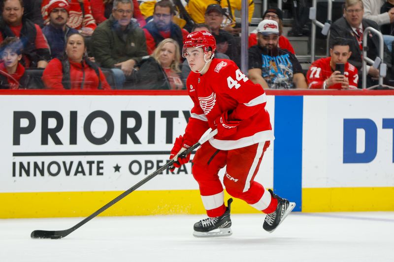 Jan 3, 2026; Detroit, Michigan, USA; Detroit Red Wings defenseman Axel Sandin-Pellikka (44) handles the puck during the second period against the Pittsburgh Penguins at Little Caesars Arena. Mandatory Credit: Brian Bradshaw Sevald-Imagn Images