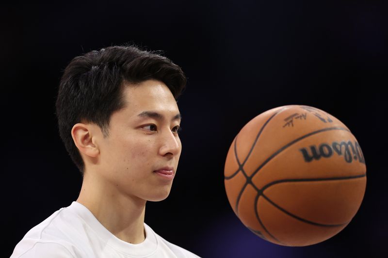 LOS ANGELES, CALIFORNIA - NOVEMBER 13: Yuki Kawamura #17 of the Memphis Grizzlies warms up during halftime of the game against the Los Angeles Lakers at Crypto.com Arena on November 13, 2024 in Los Angeles, California. NOTE TO USER: User expressly acknowledges and agrees that, by downloading and or using this photograph, User is consenting to the terms and conditions of the Getty Images License Agreement.  (Photo by Harry How/Getty Images)