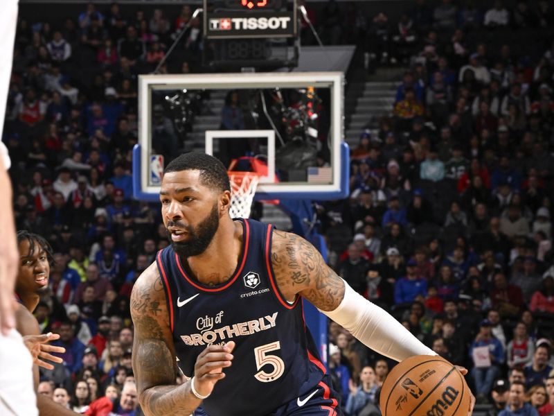 PHILADELPHIA, PA - JANUARY 6:  Marcus Morris Sr. #5 of the Philadelphia 76ers goes to the basket during the game on January 6, 2024 at the Wells Fargo Center in Philadelphia, Pennsylvania NOTE TO USER: User expressly acknowledges and agrees that, by downloading and/or using this Photograph, user is consenting to the terms and conditions of the Getty Images License Agreement. Mandatory Copyright Notice: Copyright 2024 NBAE (Photo by David Dow/NBAE via Getty Images)