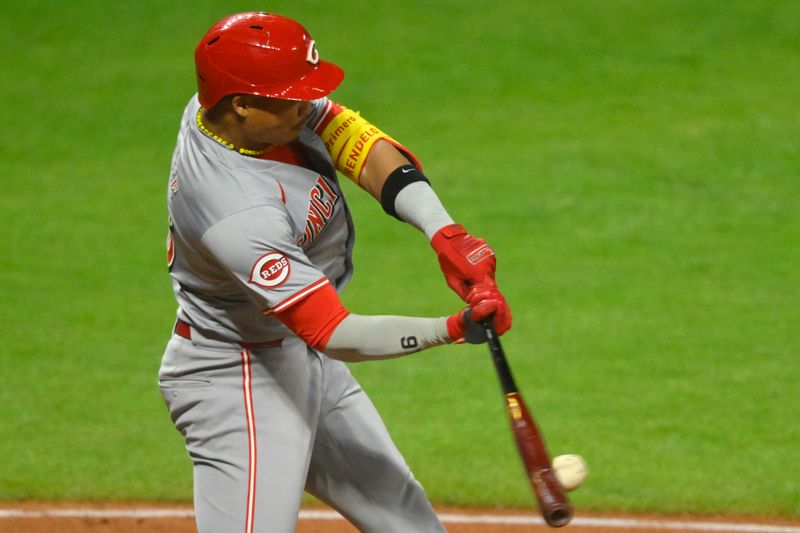 Sep 25, 2024; Cleveland, Ohio, USA; Cincinnati Reds third baseman Noelvi Marte (16) singles in the eighth inning against the Cleveland Guardians at Progressive Field. Mandatory Credit: David Richard-Imagn Images