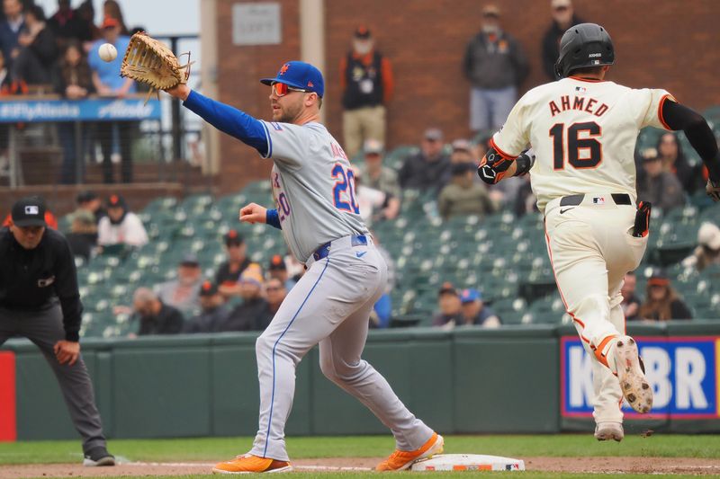 Apr 24, 2024; San Francisco, California, USA; New York Mets first baseman Pete Alonso (20) receives the ball for an out against San Francisco Giants shortstop Nick Ahmed (16) during the ninth inning at Oracle Park. Mandatory Credit: Kelley L Cox-USA TODAY Sports