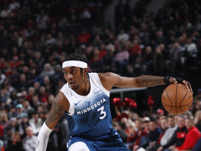 PORTLAND, OR - FEBRUARY 15: Jaden McDaniels #3 of the Minnesota Timberwolves handles the ball during the game against the Portland Trail Blazers on February 15, 2024 at the Moda Center Arena in Portland, Oregon. NOTE TO USER: User expressly acknowledges and agrees that, by downloading and or using this photograph, user is consenting to the terms and conditions of the Getty Images License Agreement. Mandatory Copyright Notice: Copyright 2024 NBAE (Photo by Cameron Browne/NBAE via Getty Images)