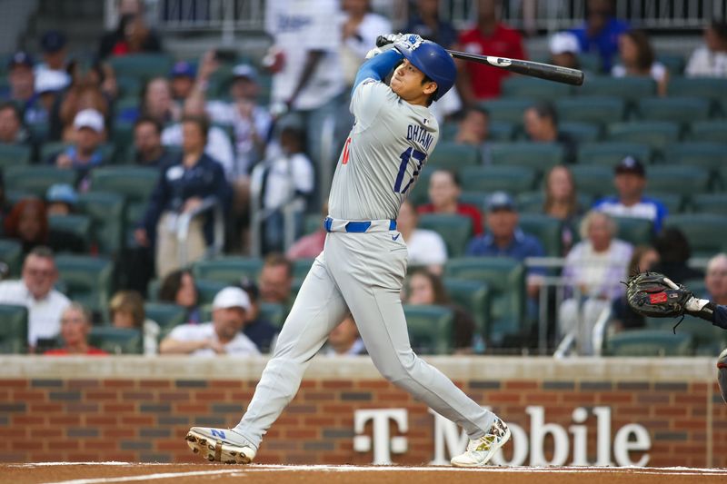 Sep 13, 2024; Atlanta, Georgia, USA; Los Angeles Dodgers designated hitter Shohei Ohtani (17) bats against the Atlanta Braves in the first inning at Truist Park. Mandatory Credit: Brett Davis-Imagn Images