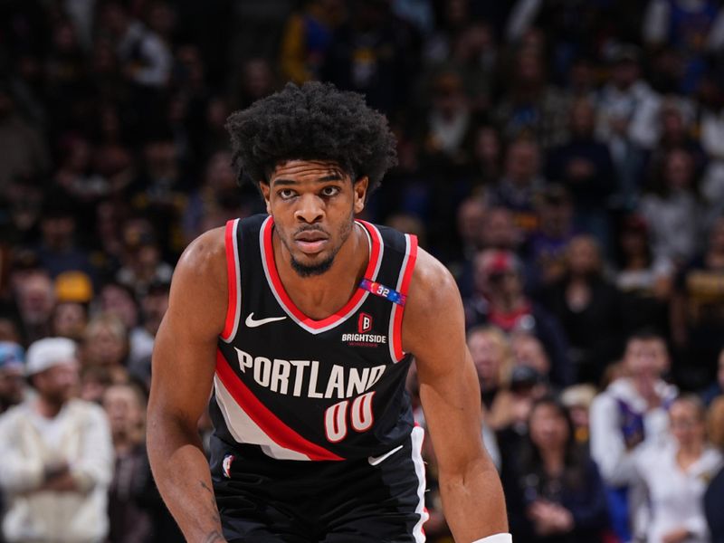 DENVER, CO - FEBRUARY 10: Scoot Henderson #00 of the Portland Trail Blazers dribbles the ball during the game against the Denver Nuggets on February 10, 2025 at Ball Arena in Denver, Colorado. NOTE TO USER: User expressly acknowledges and agrees that, by downloading and/or using this Photograph, user is consenting to the terms and conditions of the Getty Images License Agreement. Mandatory Copyright Notice: Copyright 2025 NBAE (Photo by Garrett Ellwood/NBAE via Getty Images)