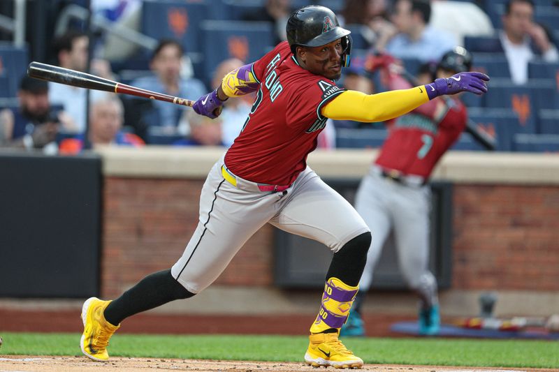 Apr 29, 2025; New York City, New York, USA; Arizona Diamondbacks shortstop Geraldo Perdomo (2) singles during the first inning against the New York Mets at Citi Field. Mandatory Credit: Vincent Carchietta-Imagn Images