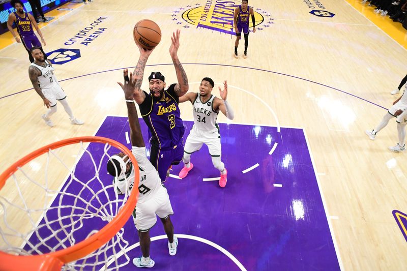 LOS ANGELES, CA - MARCH 8: Anthony Davis #3 of the Los Angeles Lakers shoots the ball during the game against the Milwaukee Bucks on March 8, 2024 at Crypto.Com Arena in Los Angeles, California. NOTE TO USER: User expressly acknowledges and agrees that, by downloading and/or using this Photograph, user is consenting to the terms and conditions of the Getty Images License Agreement. Mandatory Copyright Notice: Copyright 2024 NBAE (Photo by Adam Pantozzi/NBAE via Getty Images)