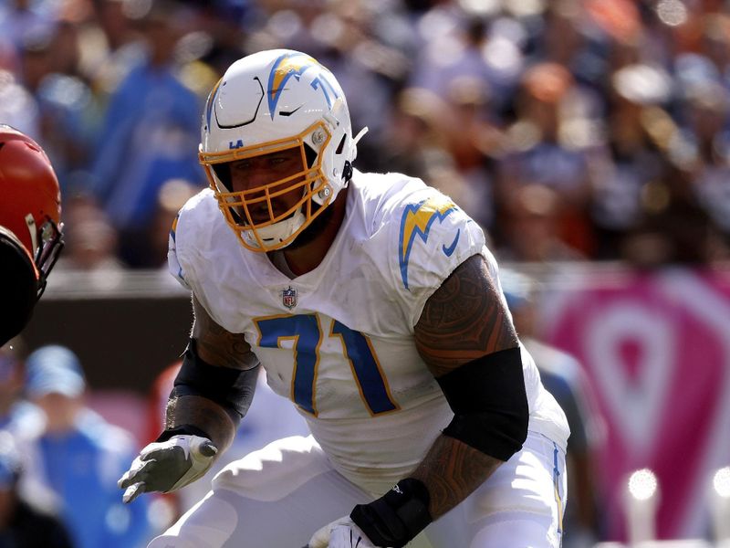 Los Angeles Chargers guard Matt Feiler (71) looks to make a block during an NFL football game against the Cleveland Browns, Sunday, Oct. 9, 2022, in Cleveland. (AP Photo/Kirk Irwin)