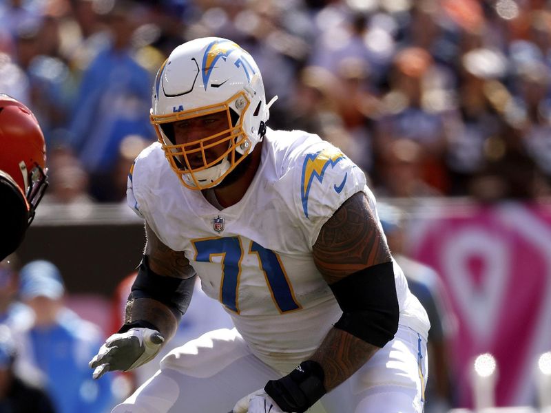 Los Angeles Chargers guard Matt Feiler (71) looks to make a block during an NFL football game against the Cleveland Browns, Sunday, Oct. 9, 2022, in Cleveland. (AP Photo/Kirk Irwin)