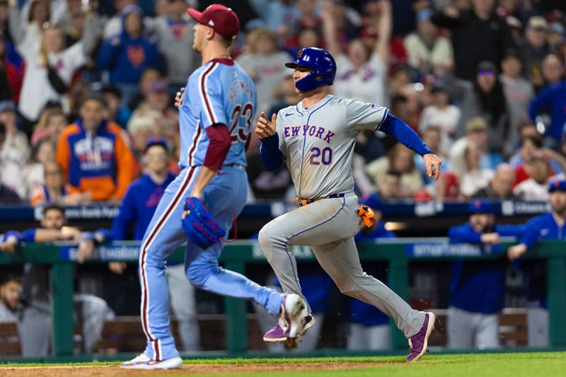 May 16, 2024; Philadelphia, Pennsylvania, USA; New York Mets first base Pete Alonso (20) scores past Philadelphia Phillies pitcher Jeff Hoffman (23) after a wild pitch during the eighth inning at Citizens Bank Park. Mandatory Credit: Bill Streicher-USA TODAY Sports