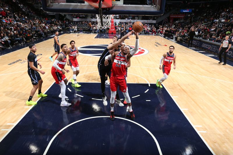 WASHINGTON, DC -? MARCH 6:  Richaun Holmes #22 of the Washington Wizards grabs the rebound during the game on March 6, 2024 at Capital One Arena in Washington, DC. NOTE TO USER: User expressly acknowledges and agrees that, by downloading and or using this Photograph, user is consenting to the terms and conditions of the Getty Images License Agreement. Mandatory Copyright Notice: Copyright 2024 NBAE (Photo by Stephen Gosling/NBAE via Getty Images)