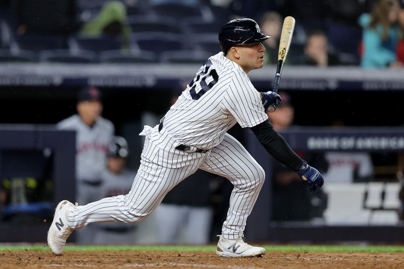 May 3, 2023; Bronx, New York, USA; New York Yankees pinch hitter Jose Trevino (39) follows through on a tenth inning walkoff RBI single against the Cleveland Guardians at Yankee Stadium. Mandatory Credit: Brad Penner-USA TODAY Sports