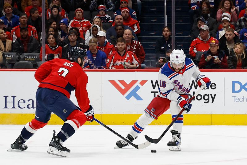 Jan 4, 2025; Washington, District of Columbia, USA; New York Rangers center Vincent Trocheck (16) skates with the puck as Washington Capitals defenseman Matt Roy (3) defends in the second period at Capital One Arena. Mandatory Credit: Geoff Burke-Imagn Images