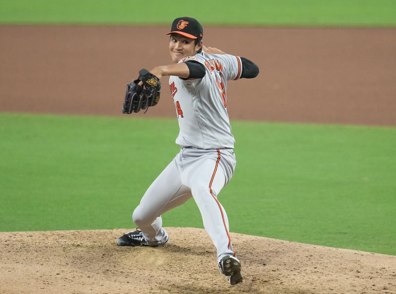 Aug 16, 2023; San Diego, California, USA;  Baltimore Orioles relief pitcher Shintaro Fujinami (14) throws a pitch against the San Diego Padres during the seventh inning at Petco Park. Mandatory Credit: Ray Acevedo-USA TODAY Sports