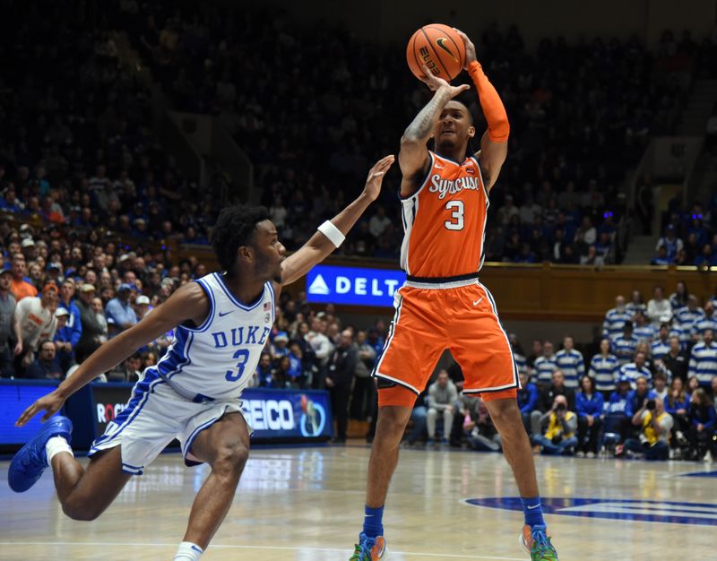 Jan 2, 2024; Durham, North Carolina, USA; Syracuse Orange guard Judah Mintz (3) shoots in front of Duke Blue Devils guard Jeremy Roach (3) during the first half at Cameron Indoor Stadium. Mandatory Credit: Rob Kinnan-USA TODAY Sports