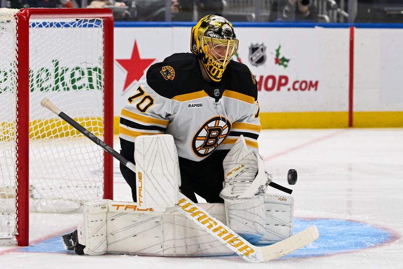 Boston Bruins Face Off Against New York Islanders with David Pastrnak Leading the Charge