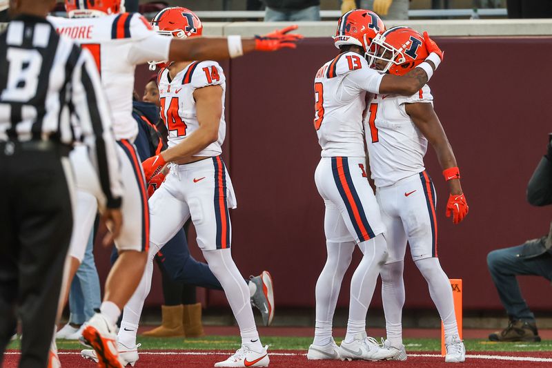 Nov 4, 2023; Minneapolis, Minnesota, USA; Illinois Fighting Illini wide receiver Isaiah Williams (1) celebrates his touchdown during the second half against the Minnesota Golden Gophers at Huntington Bank Stadium. Mandatory Credit: Matt Krohn-USA TODAY Sports