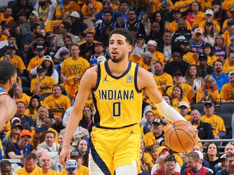 INDIANAPOLIS, IN - MAY 25: Tyrese Haliburton #0 of the Indiana Pacers dribbles the ball during the game against the New York Knicks  during Game Three of the Eastern Conference Finals on May 25, 2025 at Gainbridge Fieldhouse in Indianapolis, Indiana. NOTE TO USER: User expressly acknowledges and agrees that, by downloading and or using this Photograph, user is consenting to the terms and conditions of the Getty Images License Agreement. Mandatory Copyright Notice: Copyright 2025 NBAE (Photo by Ron Hoskins/NBAE via Getty Images)