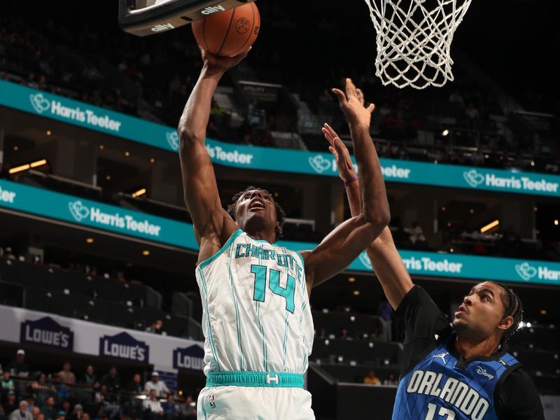 CHARLOTTE, NC - NOVEMBER 25:  Moussa Diabate #14 of the Charlotte Hornets shoots the ball during the game against the Orlando Magic during a regular season game on November 25, 2024 at Spectrum Center in Charlotte, North Carolina. NOTE TO USER: User expressly acknowledges and agrees that, by downloading and or using this photograph, User is consenting to the terms and conditions of the Getty Images License Agreement. Mandatory Copyright Notice: Copyright 2024 NBAE (Photo by Kent Smith/NBAE via Getty Images)